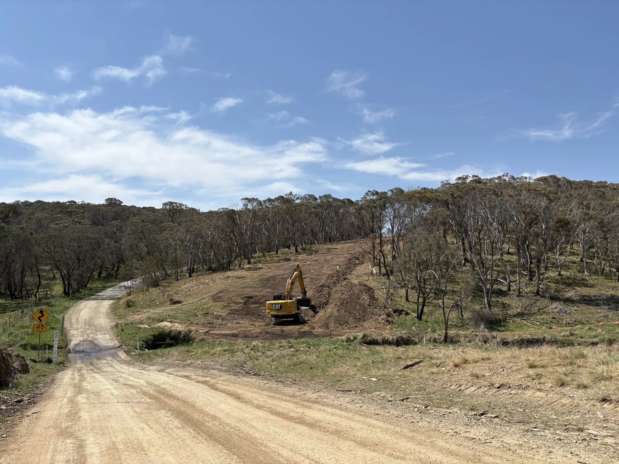 Excavator completing earthworks and clearing beside the Rockvale Road alignment